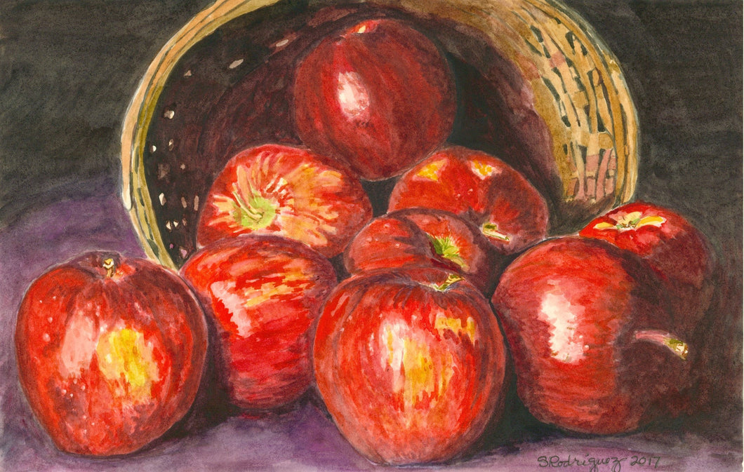 Red apples laying in a basket still life